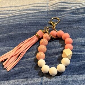 Elegant Pink and White Beaded Keychain with Tassel